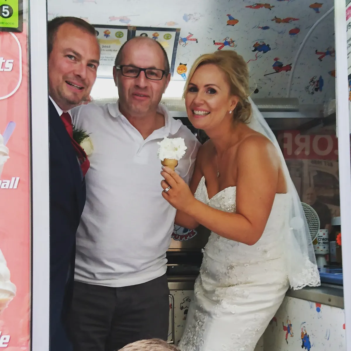 Bride and groom with Austin inside the ice cream van on their wedding day