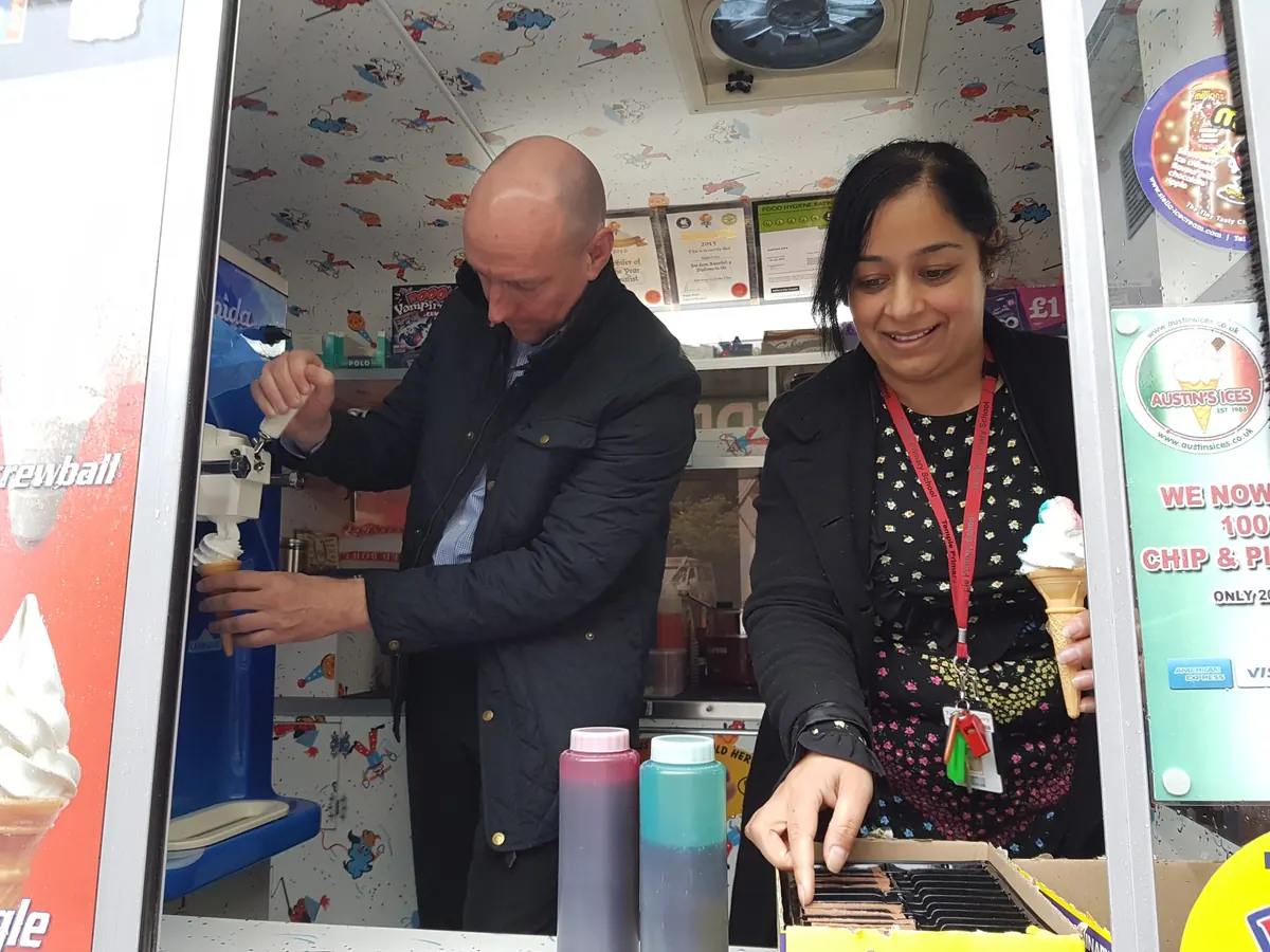 Teachers serving pupils from inside the Austins Ices van