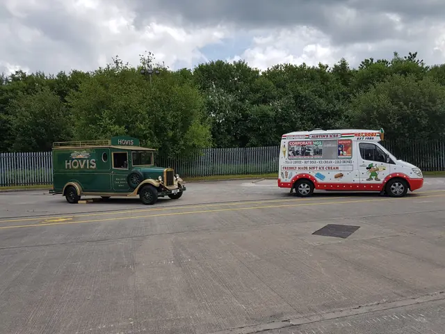 Our van alongside a vintage Hovis delivery van
