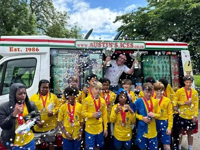 Young champions celebrating with an ice cream