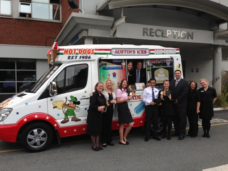 Cresta Court Hotel staff with the Austins Ices van branded for the hotel